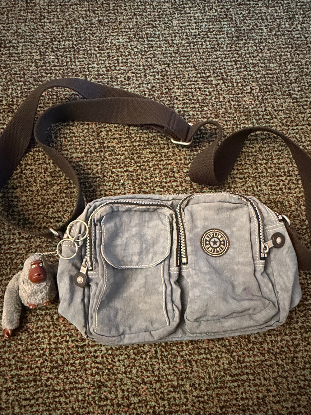 Kipling Light Blue Grey Multi-Pocket Crossbody Bag with Monkey Charm